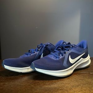 blue Nike running shoes